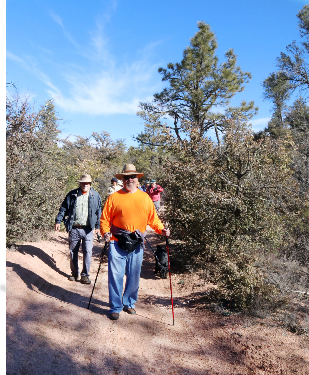Hikers on Monument Peak Loop trail vertical